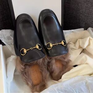 Gucci Black Leather Heeled Boots with Gold Accents